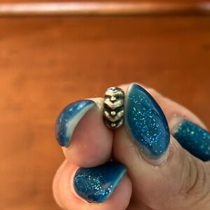 Pandora sterling silver hearts spacer.